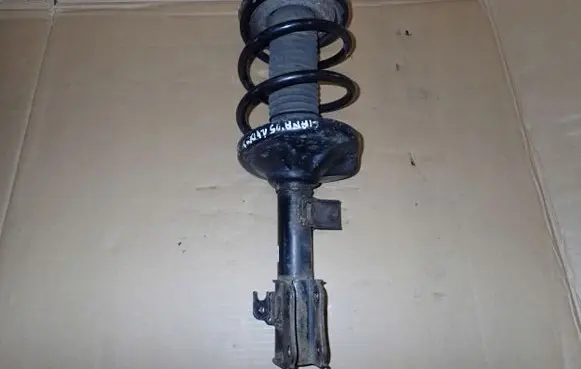 Suzuki Liana Front shock absorber with coil spring