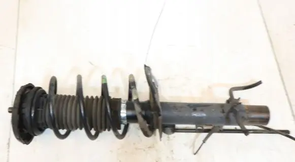 Front shock absorber with coil spring