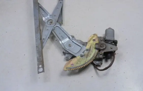 Rear door window regulator with motor