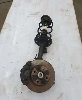 Front shock absorber with coil spring