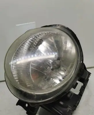 Nissan Juke I F15 Headlight/headlamp
