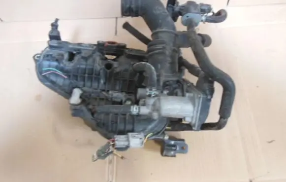 Toyota Yaris Intake manifold 2203047040