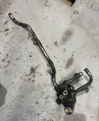 Thermostat/thermostat housing