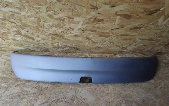 Rear bumper trim bar molding