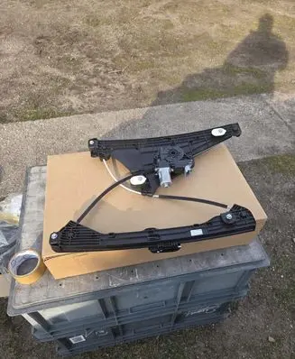 Opel Corsa F Front door window regulator with motor 9829043680