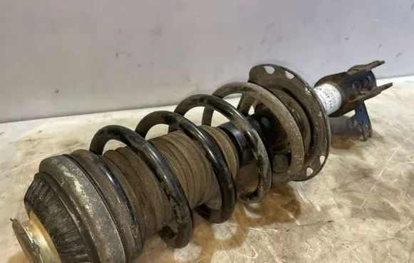 Front shock absorber with coil spring