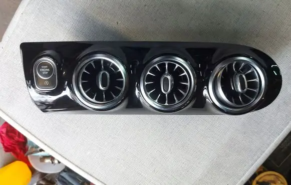 Dash center air vent grill
