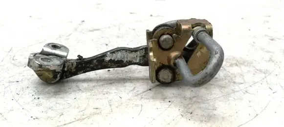 Front door check strap stopper