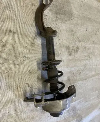 Front shock absorber with coil spring