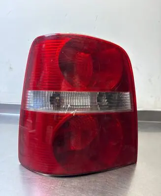 Tail light bulb cover holder
