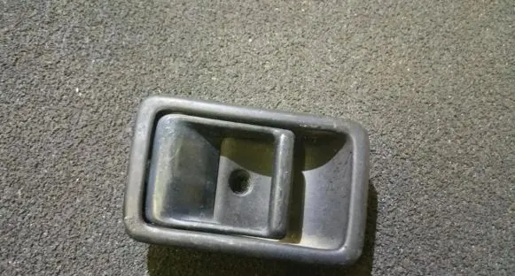 Mazda 323 Rear door interior handle