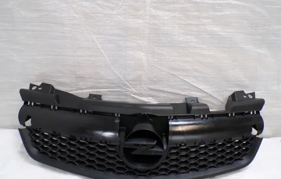 Opel Zafira B Front bumper upper radiator grill 13223210