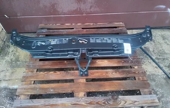 Top upper radiator support slam panel
