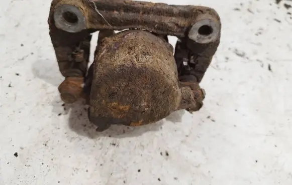 Suzuki Grand Vitara I Front brake caliper