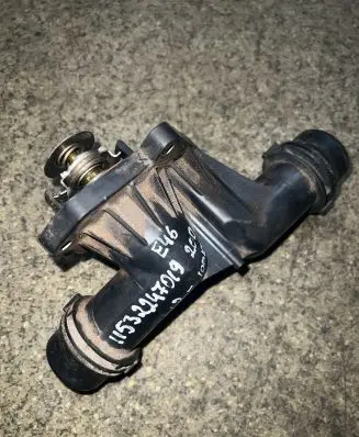 Thermostat/thermostat housing