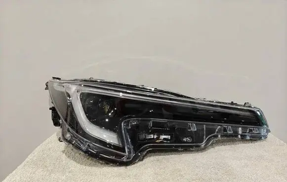 Toyota Corolla E210 E21 Headlight/headlamp 8111002X10 7662997 01XX001118
