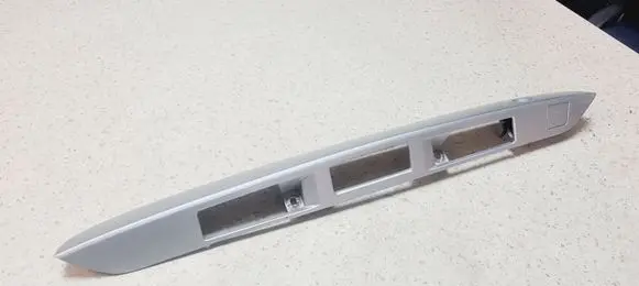 Trunk door license plate light bar