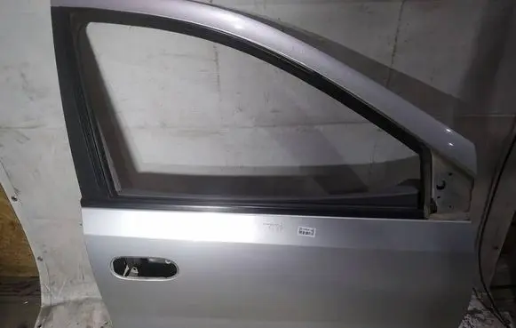 Nissan Almera Tino Front door PILKOS
