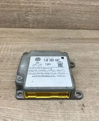 Volkswagen PASSAT B5 Airbag control unit/module 1J0909607 5WK4199