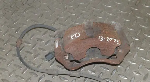 Volkswagen Golf VII Front brake caliper