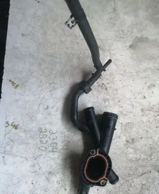 Volkswagen Golf VI Engine coolant pipe/hose 03L121131AA