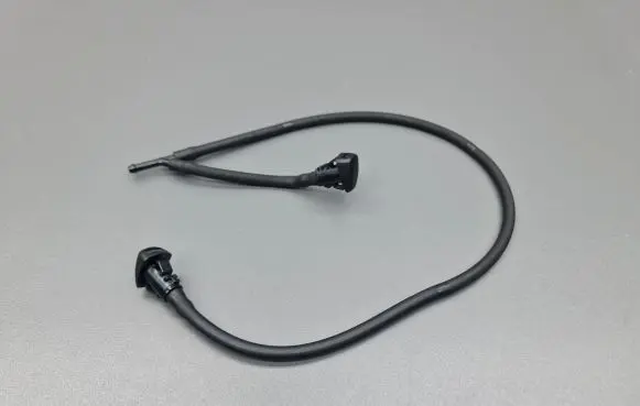 Windshield washer spray nozzle