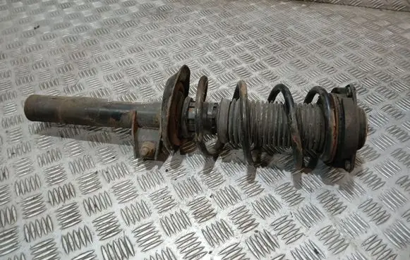 Volkswagen Golf VI Front shock absorber with coil spring 