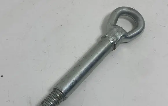 Towing hook eye
