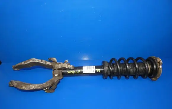 Volvo XC90 Front shock absorber with coil spring 31451073
