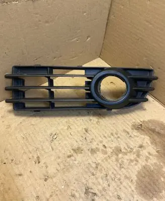 Mitsubishi Colt Front fog light trim/grill MN105197