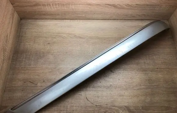 Rear bumper trim bar molding