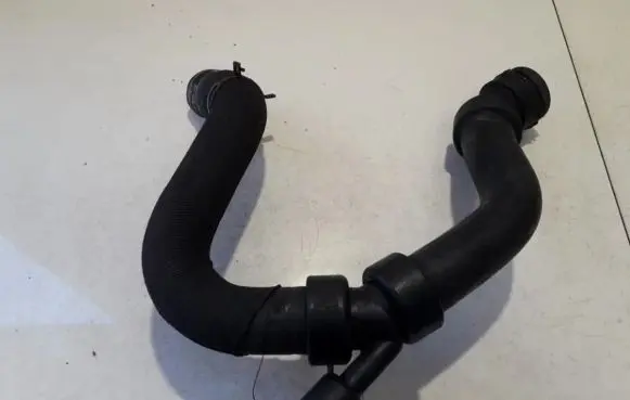 Volkswagen PASSAT B5 Engine coolant pipe/hose 4b0121101