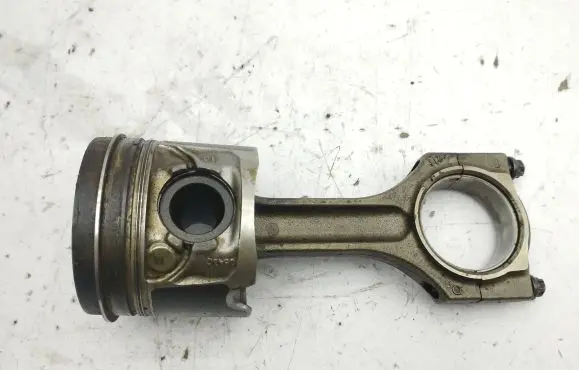Piston with connecting rod
