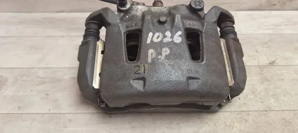 Nissan NV200 Front brake caliper 