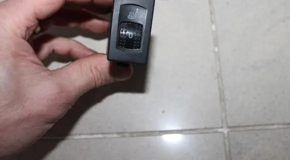 Seat heating switch
