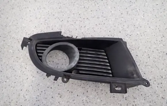 Mitsubishi Lancer Front fog light trim/grill MN126456