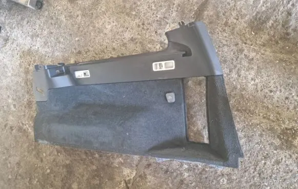 Trunk/boot lower side trim panel