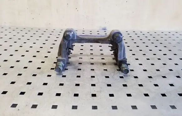 Tesla Model 3 Brake caliper pad carrier rear 