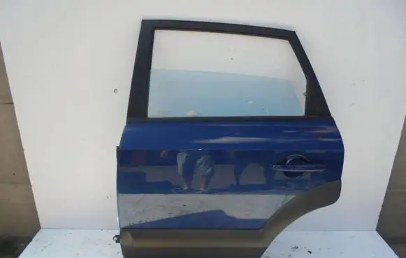 Hyundai Tucson JM Rear door