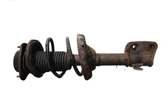 Subaru Impreza II Front shock absorber with coil spring