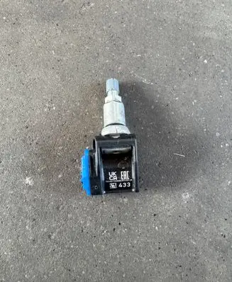 Mercedes-Benz C W206 Tire pressure sensor A0009058413