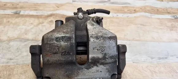 Volkswagen Golf VI Front brake caliper