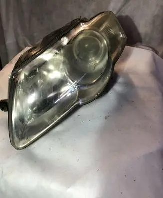 Volkswagen PASSAT B6 Headlight/headlamp 1LL24701403
