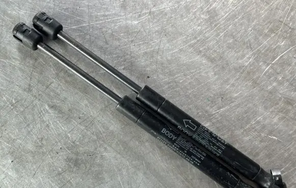 Nissan Qashqai Front bonnet/hood damper/strut 89343EY10A
