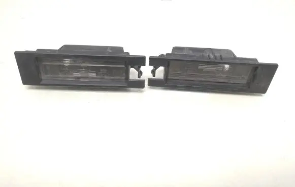 Opel Zafira B Number plate light 0461200 57581