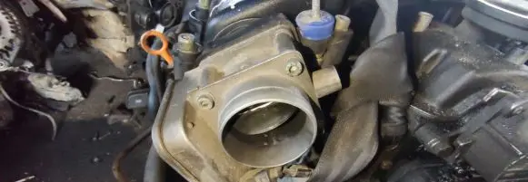 Volkswagen Golf IV Throttle valve 038128063c