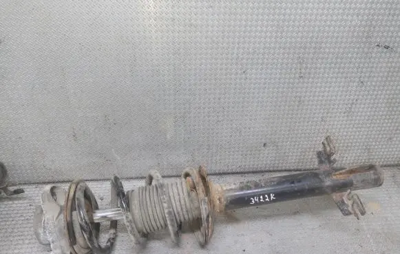Front shock absorber with coil spring