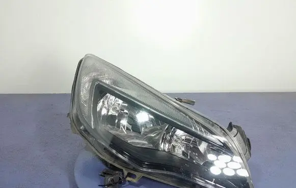 Opel Astra J Headlight/headlamp 13371596