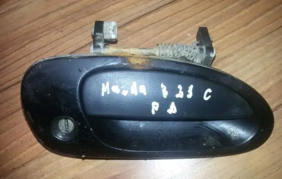 Mazda 323 Front door exterior handle