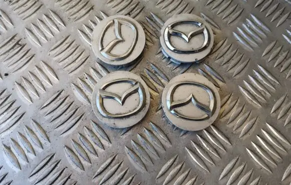 Mazda 626 Original wheel cap 2477 2874